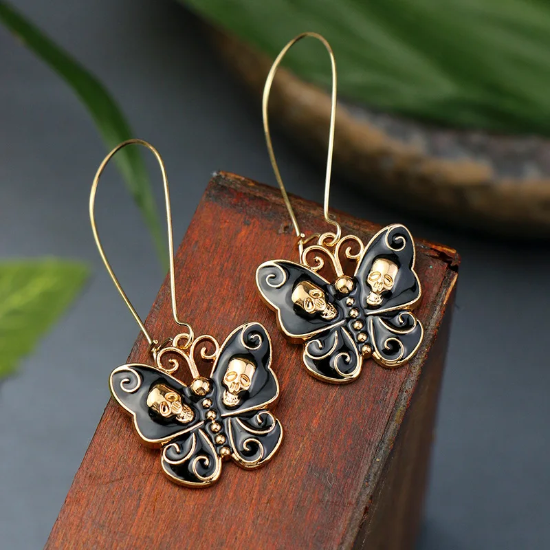 European and American Halloween earrings, white gold, black oil-dripping butterfly alloy skull and ear jewelry whol
