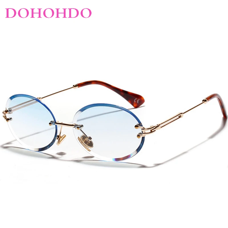 

DOHOHDO 2024 Fashion New Retro Frameless Oval Sunglasses For Men Women Crystal Texture Sun Glasses Trendy Eyewear Shades UV400