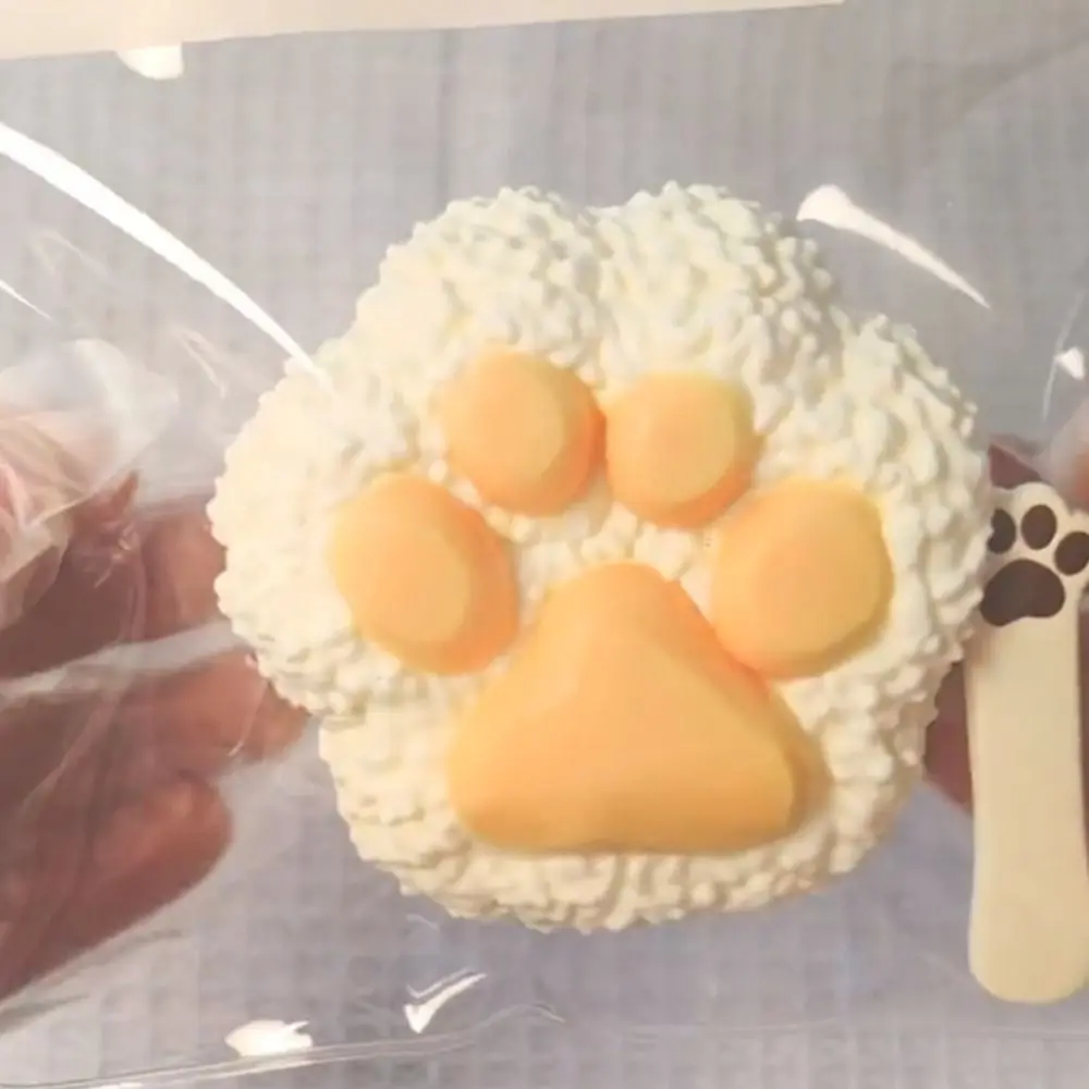 

Interesting Croissant Cat Croissant Squeeze Toy Slow Rebound Kneading Cartoon Fidget Toy TPR 3D Cat Paw Pinch Toy Children