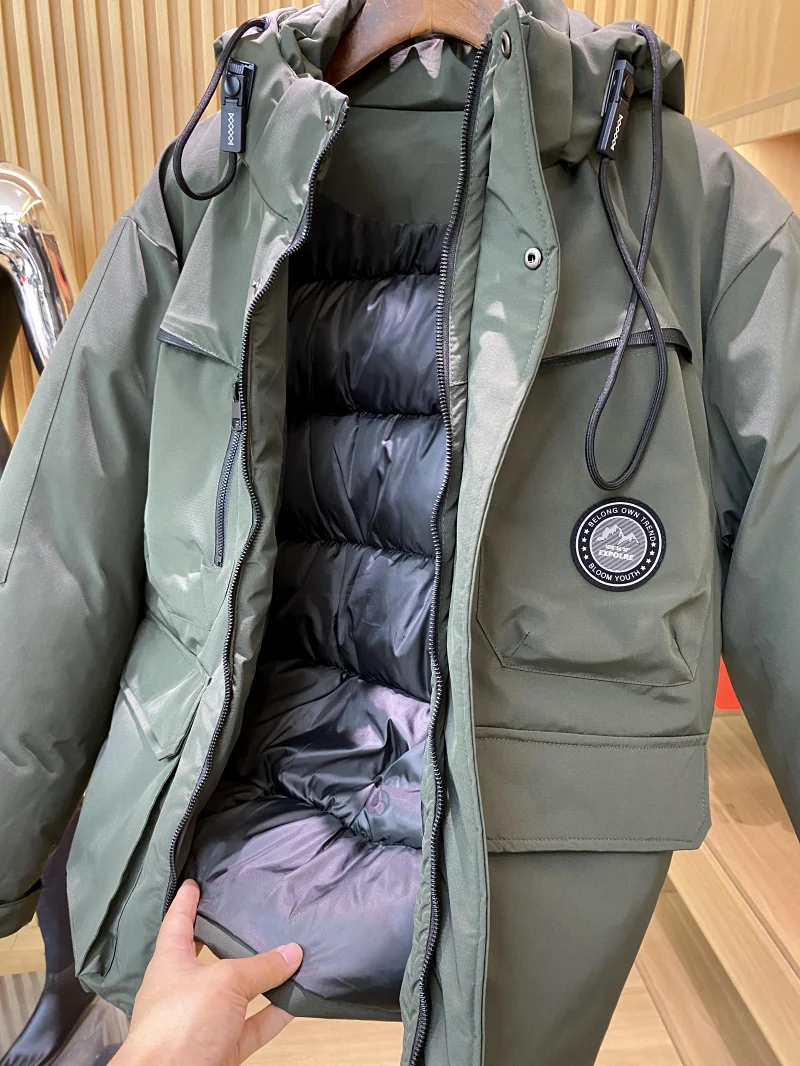 ارتفاع تخفيف القطن Jaet ex في الهواء الطلق الدافئة تنفس مقاوم للماء ربيع الخريف الشتاء الموسمية Faionable معطف مقنع