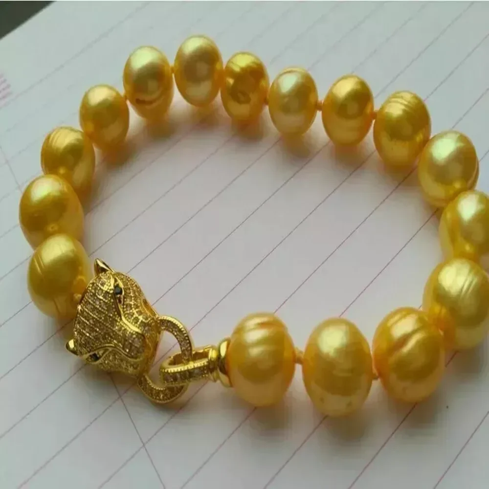 

Bestselling AAA 10-11 mm Nanhai Gold Pearl Bracelet 925s 7.5-8 inches 9-10mm