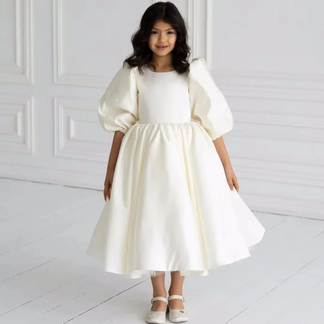 ชุดเดรสเด็กหญิงสีงาช้างแบบสั่งตัด ผ้าซาติน ผ้าทูลล์ ประดับมุก แขนครึ่งแขน สำหรับงานแต่งงาน งานวันเกิด งานประกวด งานเลี้ยง งานรับศีลมหาสนิท