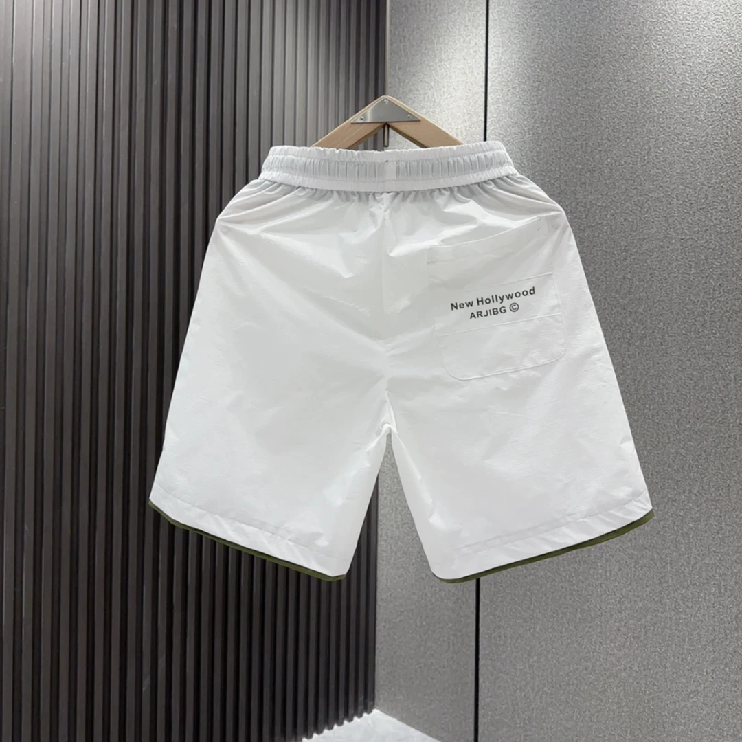 

Летние новые легкие роскошные мужские повседневные орты Модные универсальные легкие дышащие уличные спортивные штаны на пять литров...