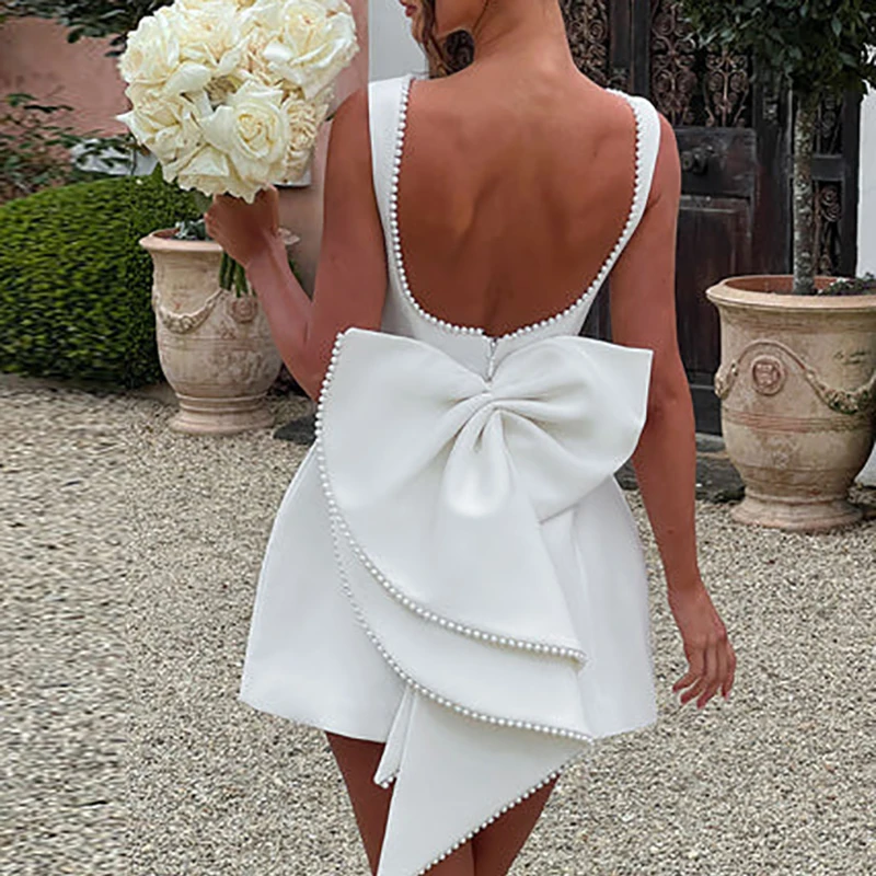 

Sexy Hollow Out Backless Bow Party Dress Fashion O Neck Waist Solid Short Dress Pearl Patchwork Slim Women A-line Dress Vestidos