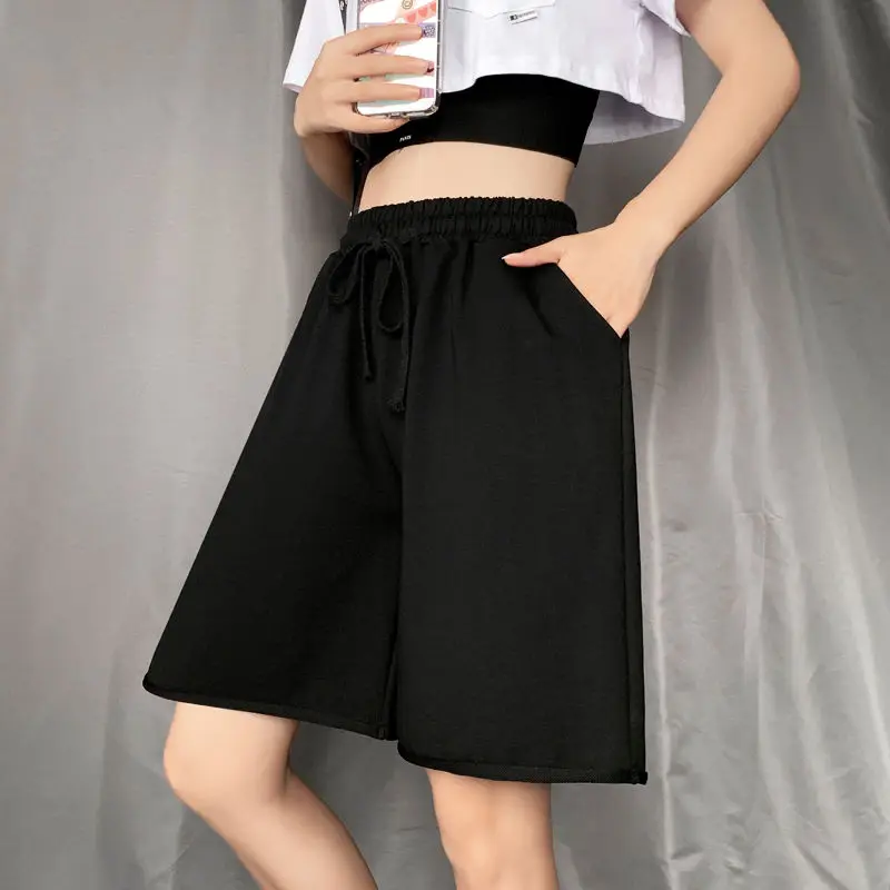 Calções femininos na altura do joelho streetwear lazer sólido cordão solto verão novo unisex friso estilo japonês chique na moda ulzzang