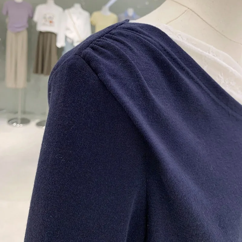 Camisetas de manga larga para mujer con hombros descubiertos y cuello oblicuo de retazos de encaje Sexy diseño femenino moda estilo coreano Tops para mujer sólido nuevo