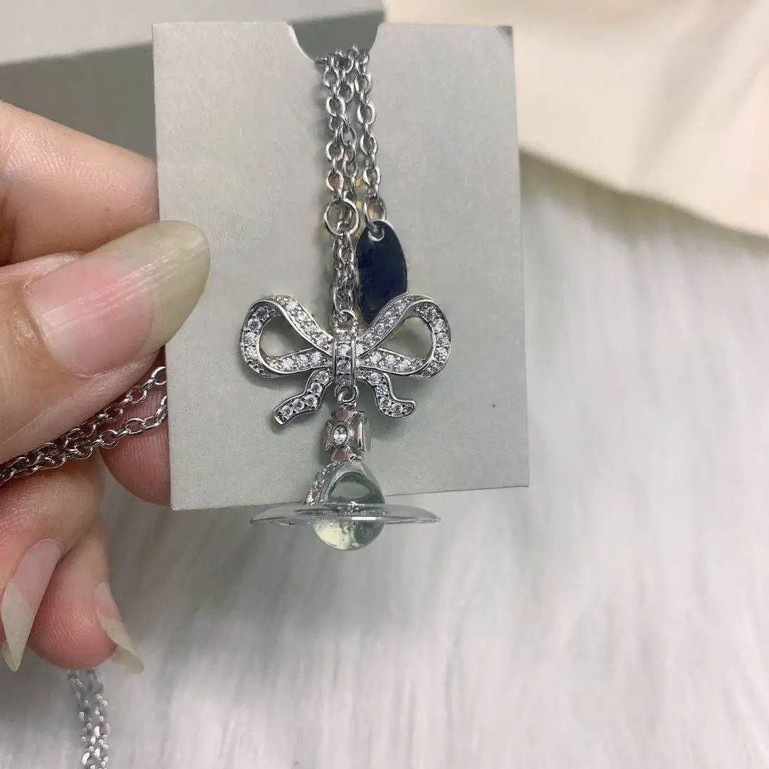 S925 فضة الأبيض ضوء القمر القوس ستيريو زحل قلادة قلادة السيدات أنيقة رومانسية الملحقات