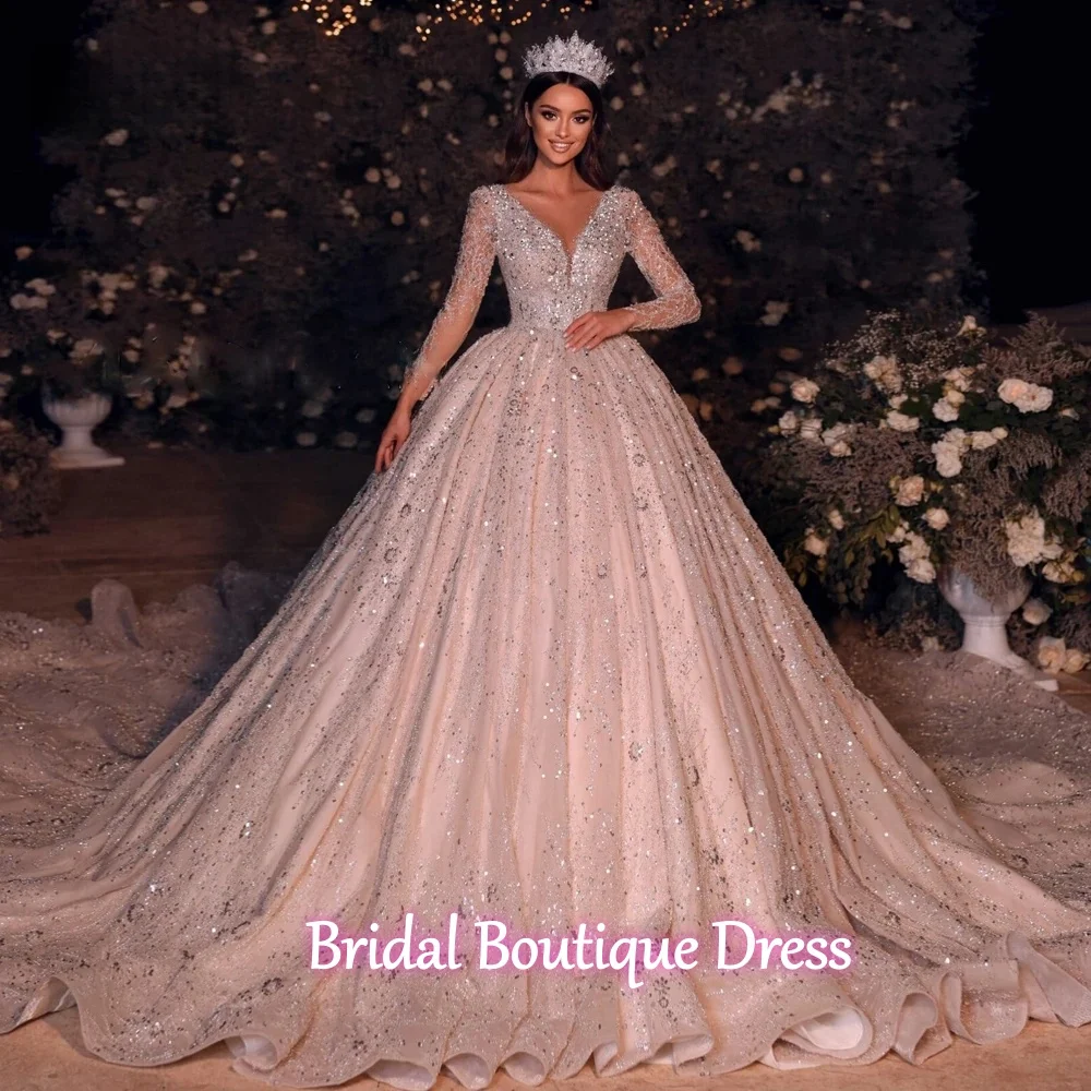 

Customized Luxury Ball Gown Royal Wedding Dresses Shining brightly Long Sleeve Lace Beaded Chapel Train Bridal Gown Vestido De