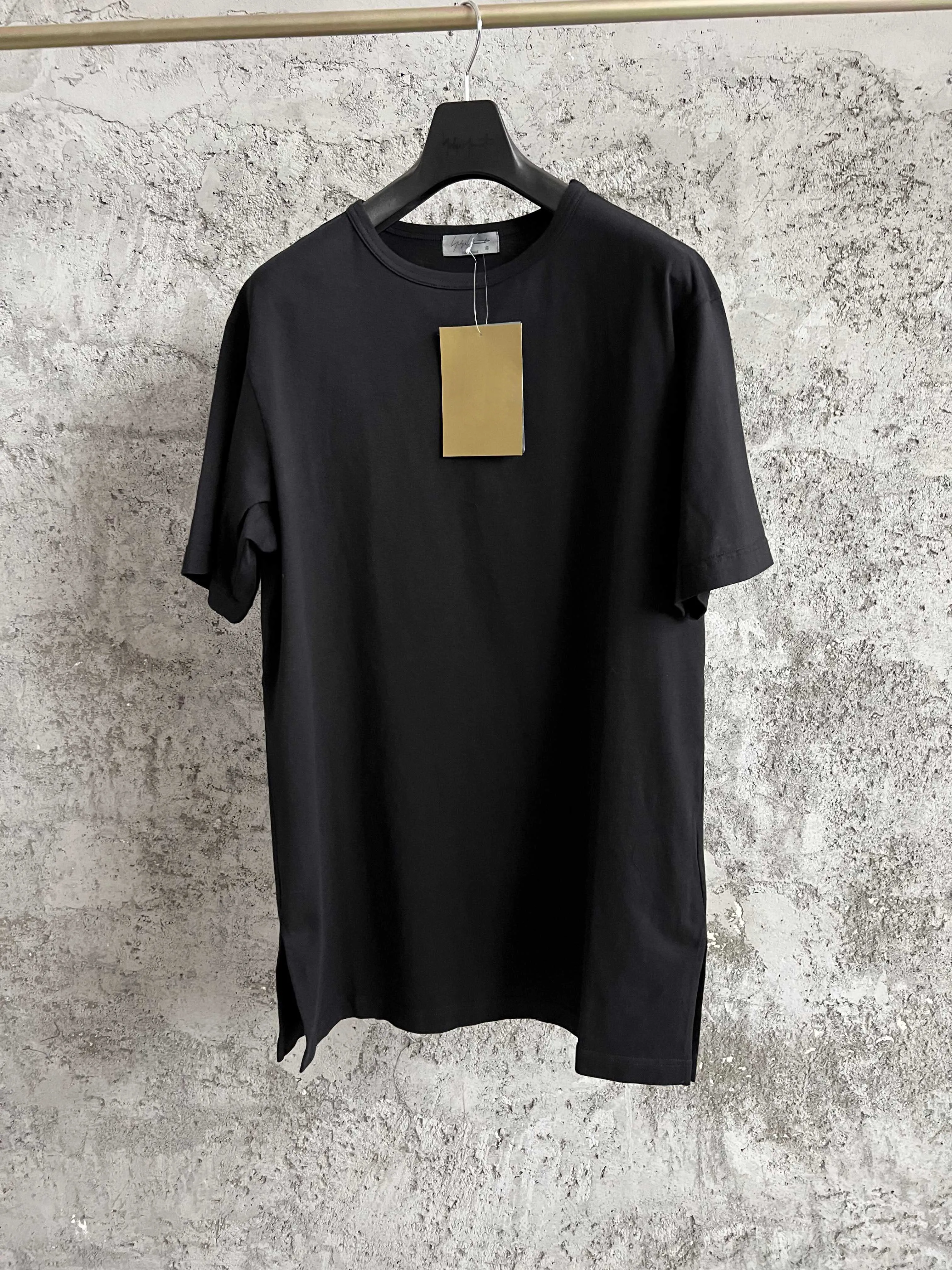 

Original black short-sleeved drawstring T-shirt designed by a Japanese niche streetwear brand's original male designer