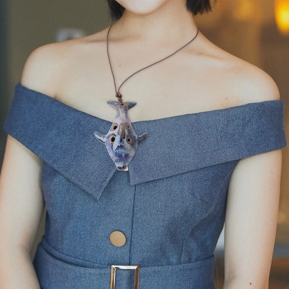 

1 шт. керамическая окарина в форме рыбы с 6 отверстиями для детей и начинающих: нежный звук, легкое дудление, легкий вес, портативный музыкальный инструмент