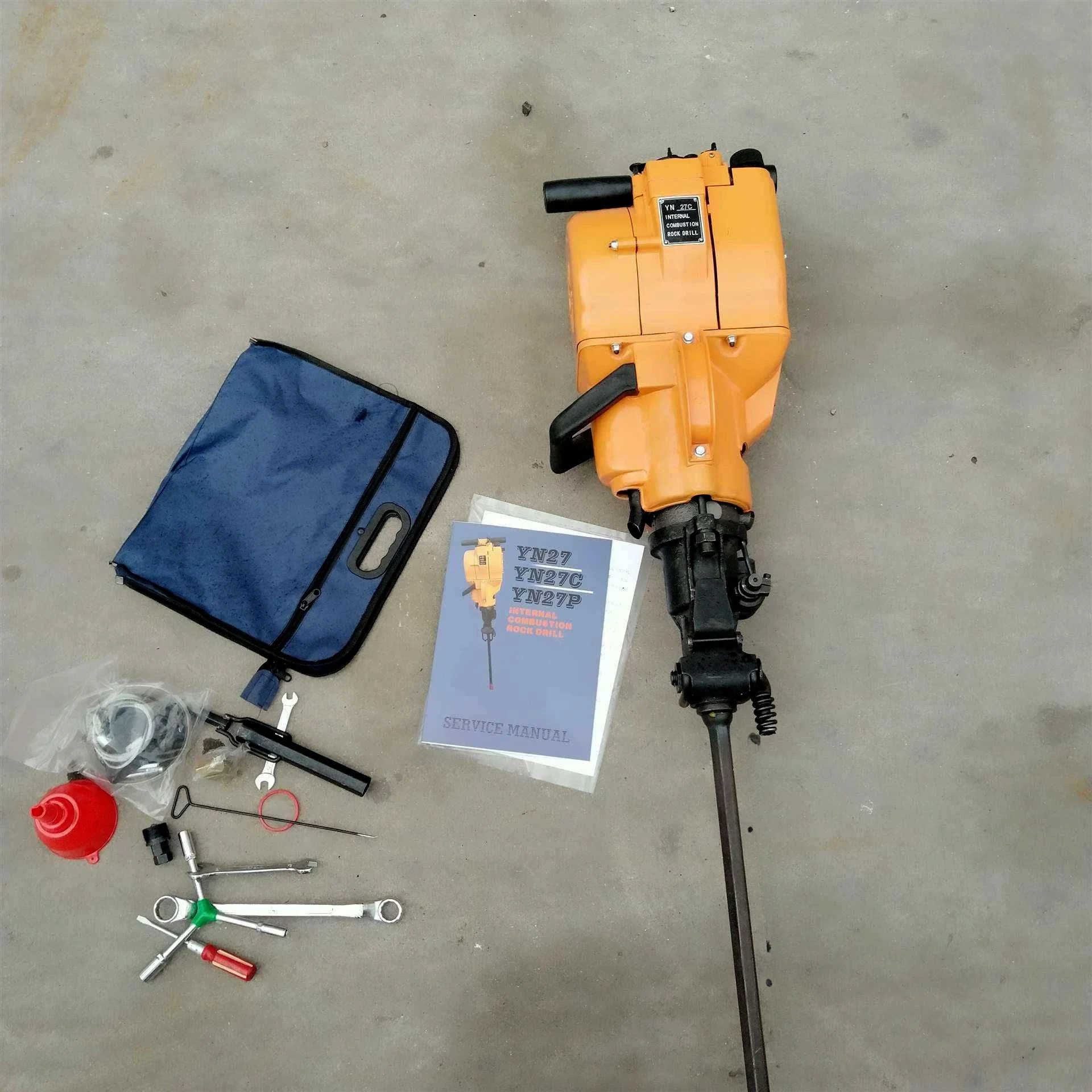 Portable internal combustion rock drill/ crusher for mining