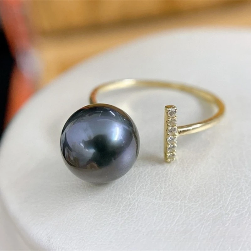 

Кольцо с натуральным черным круглым жемчугом диаметром 9–10 мм и регулируемым браслетом