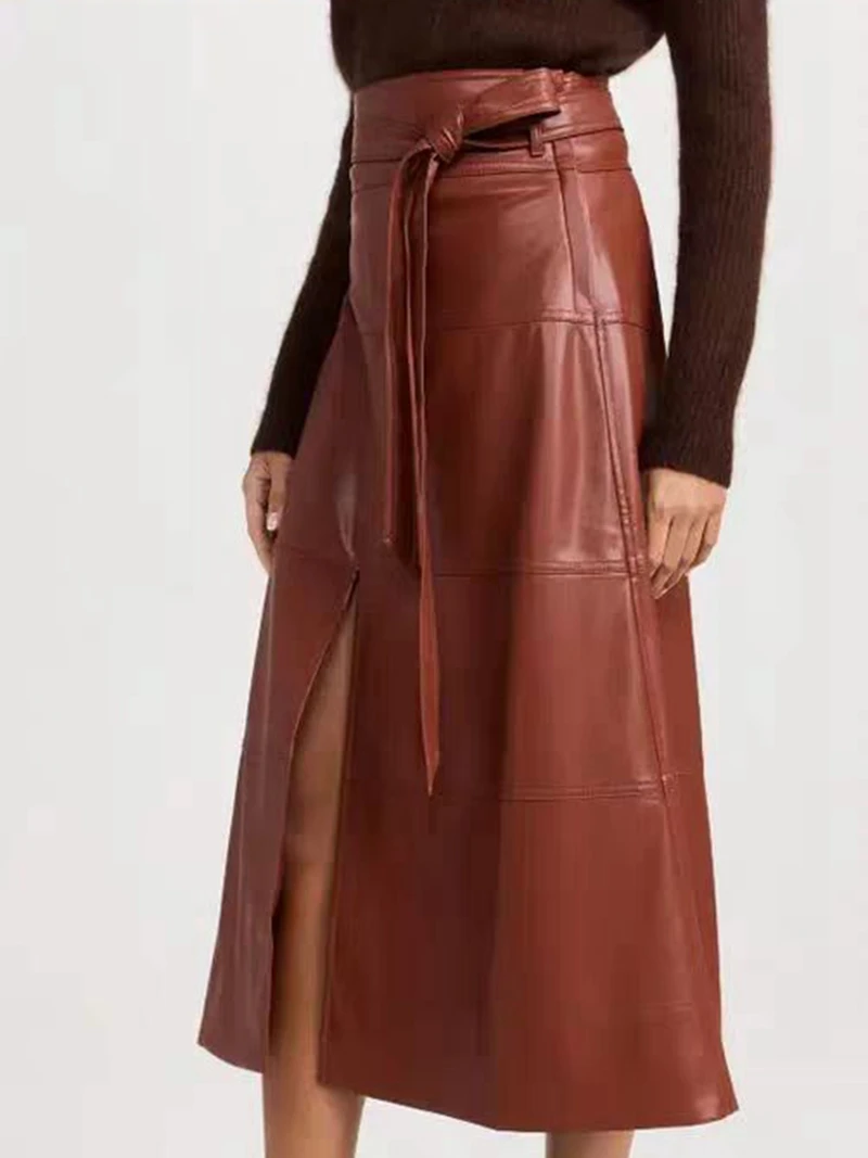 Half skirt women's autumn fashion trend wine red women's imitation leather high-end belt decoration front slit long half skirt