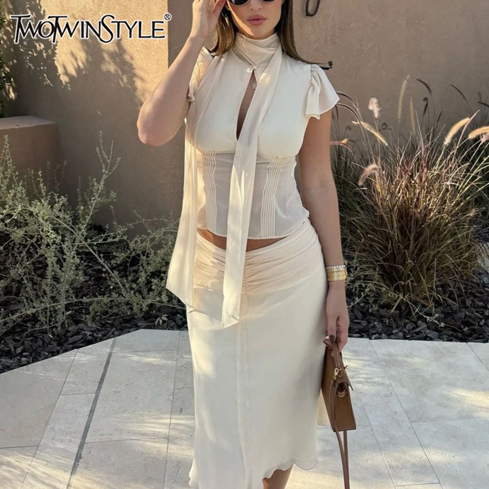 TWOTWINSTYLE Solid Loose Spliced Hollow Out Shirts for Women Turtleneck Short Sleeve Vacation Casual Shirt Female Summer Fashion