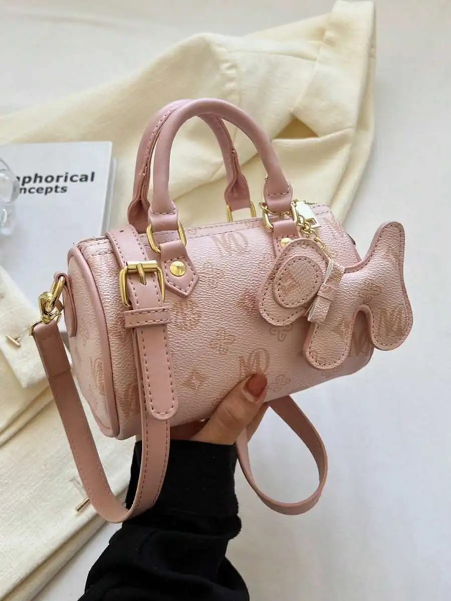 

Pink PU Leather Top-Handle Pillow Bag with Monogram Print and Fish-Shaped Charm