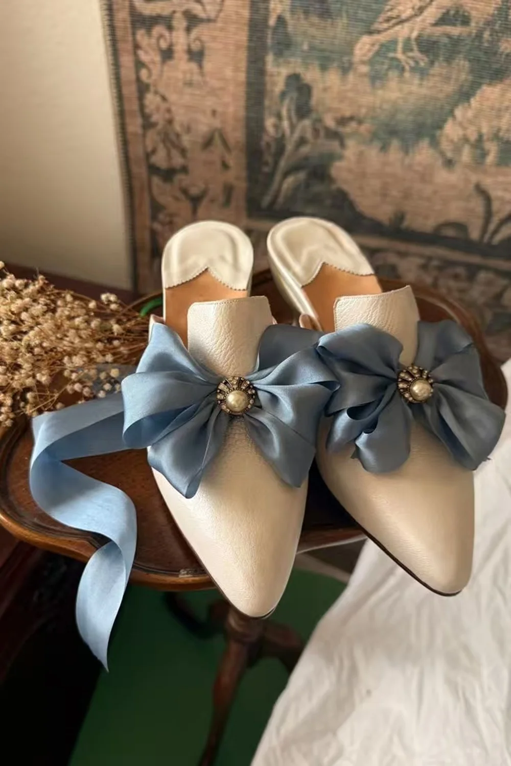 

Cream Leather Block Heel Mule Heels Dusty Blue Satin Bow Pearl Accent Pointed Toe Open Back Elegant Style Fashion High Heels