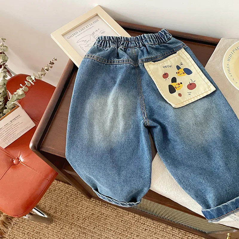 Jeans 2024 Autumn New Product Childrens Clothing Denim Pants Cartoon Printed Pocket Comfortable and Casual Child Interest