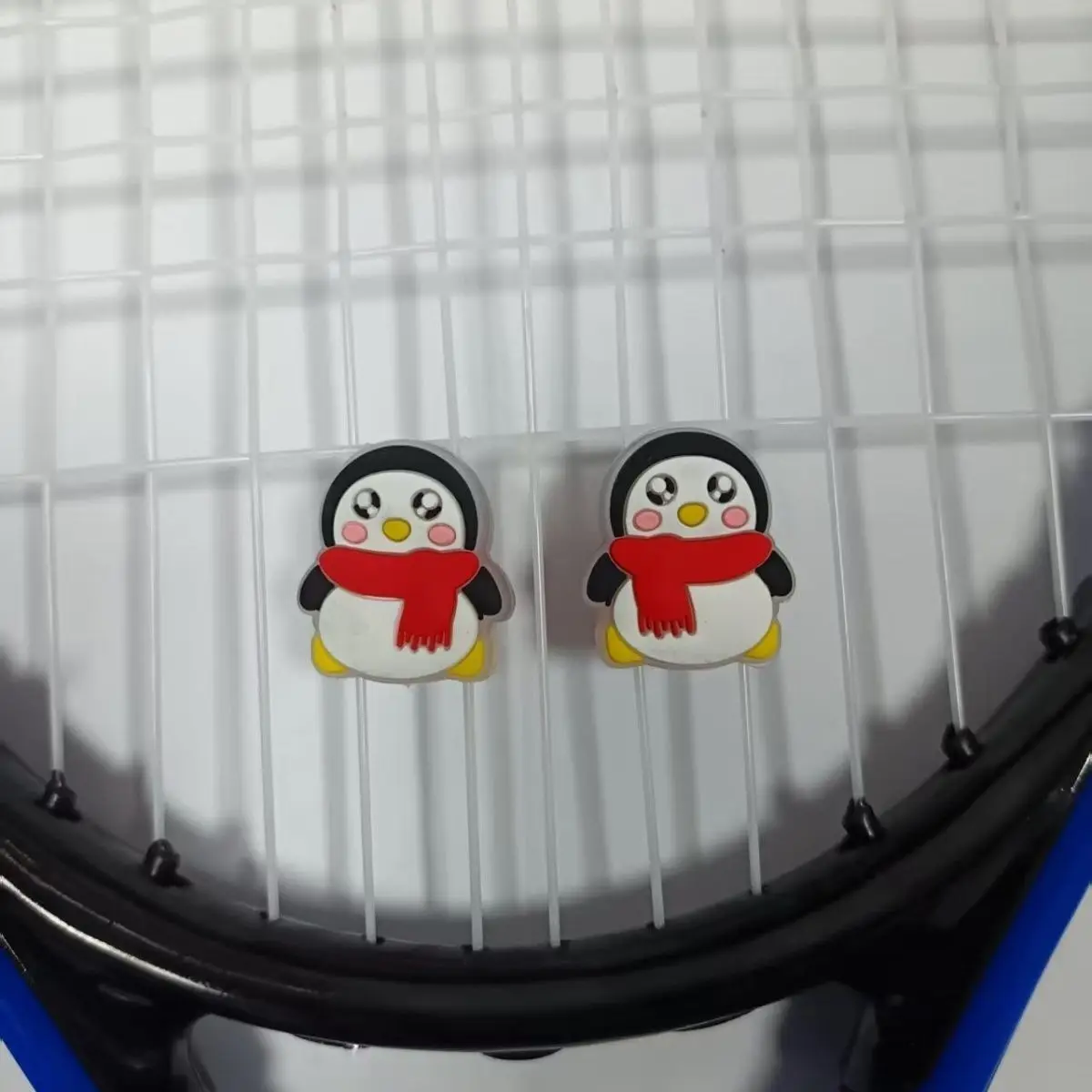 New Penguin-shaped Silicone Vibration Dampener for Tennis, Badminton and Squash Rackets