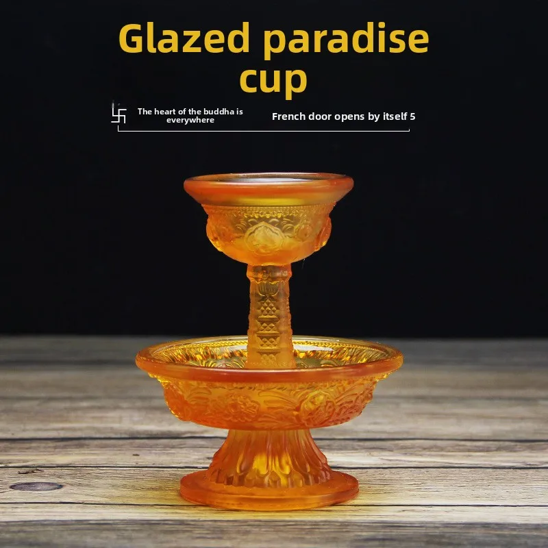 

Tibetan Buddhist Offering Cup Amber Colored Water Glass Eight Auspicious Symbols Sacred Ritual Item