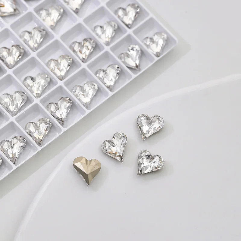 40 piezas de cuyas decoraciones para uñas con forma de corazón torcido