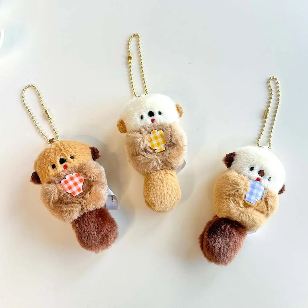 ตุ๊กตาหวาน Otter Hold Shell Key Chain สไตล์เกาหลี Trinket กระเป๋าเป้สะพายหลัง Charms ตุ๊กตาการ์ตูนอะนิเมะ Key แหวนหญิง