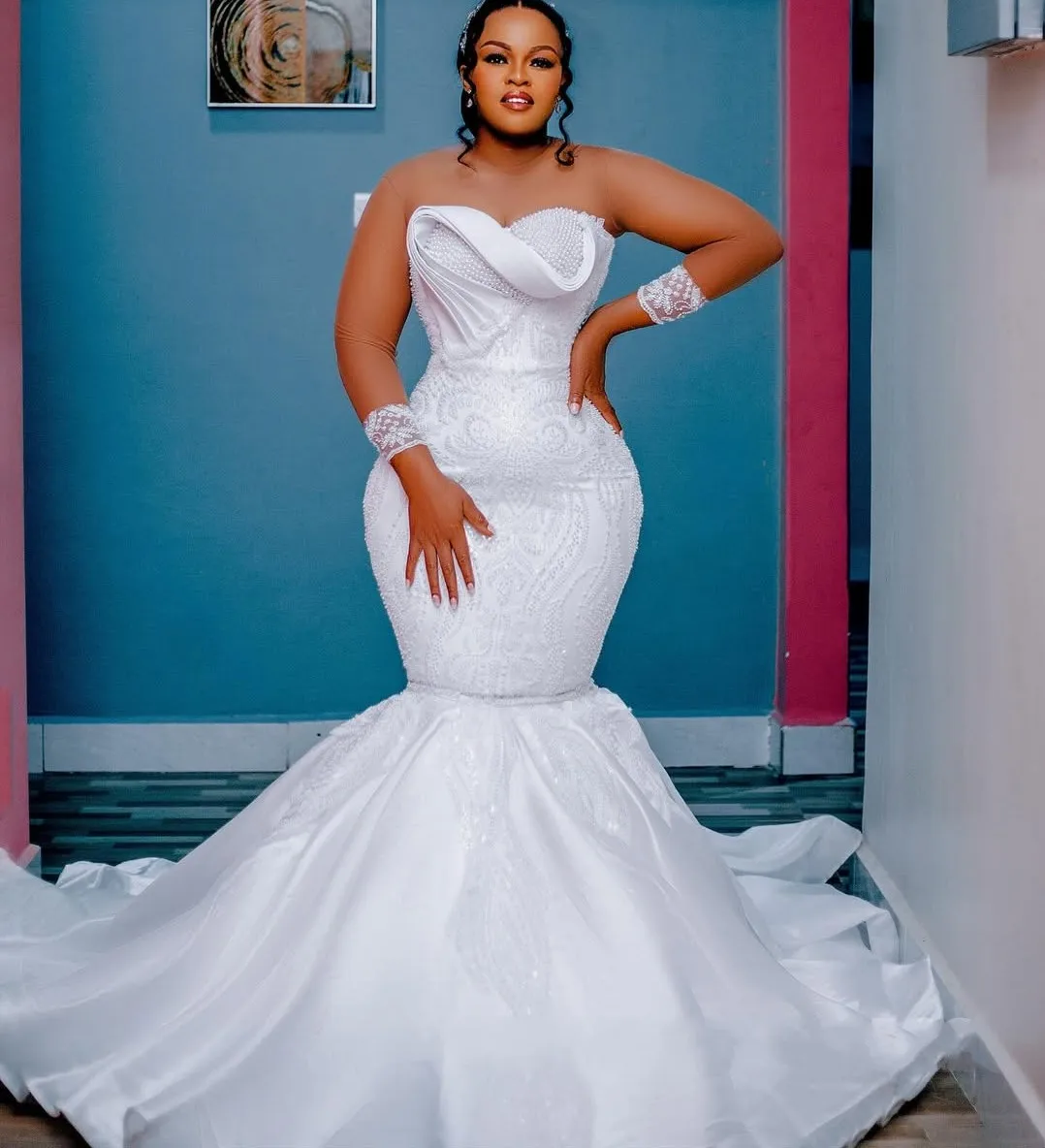 

Plus Size African Wedding Dress Bridal Gowns For Bride Mermaid Sheer Neck Long Sleeves Beaded Tiered Luxury Lace Pearl Vestidos