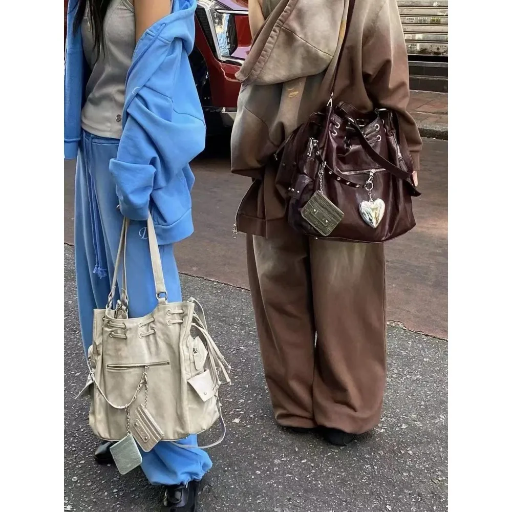 

2025 New Fanshion Rivet Motorcycle Style Large Capacity Cross Shoulder Tote Bag Premium Commuter Messenger Inclined Shoulder Bag