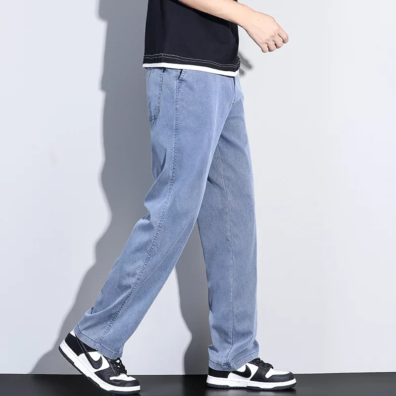 2024 New Summer High Quality Soft Lyocell Fabric Jeans Men Elastic Waist Loose Straight Thin Denim Trousers Male Plus Size M-5XL