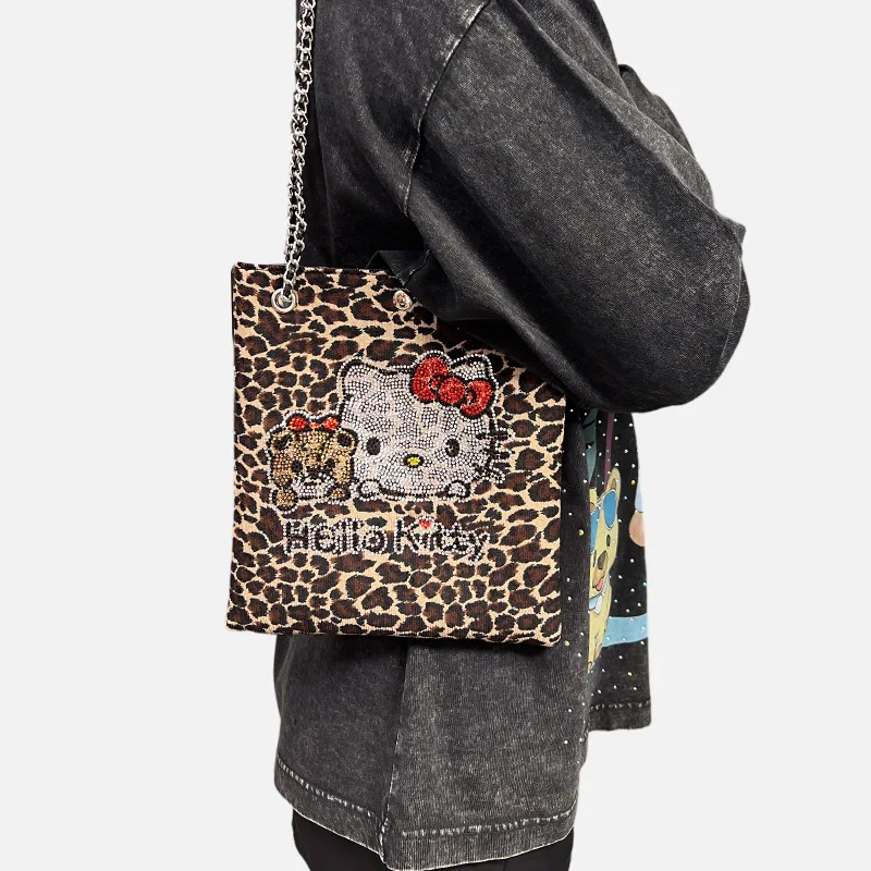 

New diamond-encrusted Hello Kitty leopard print ladies one-shoulder diagonal bag mobile phone bag