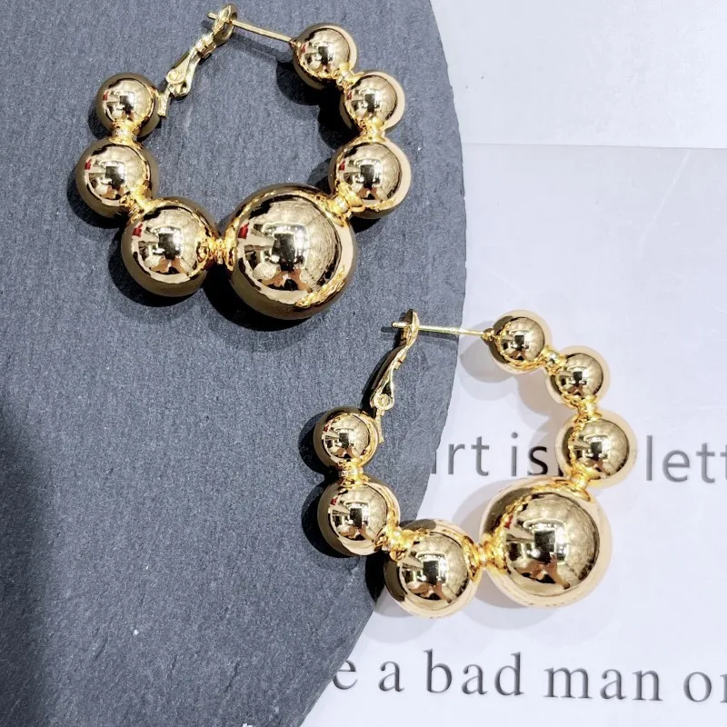 2026 new European and American Cold Style Personalized Round Bead Earrings for Women, Niche Design, High-end Zircon Jewelry