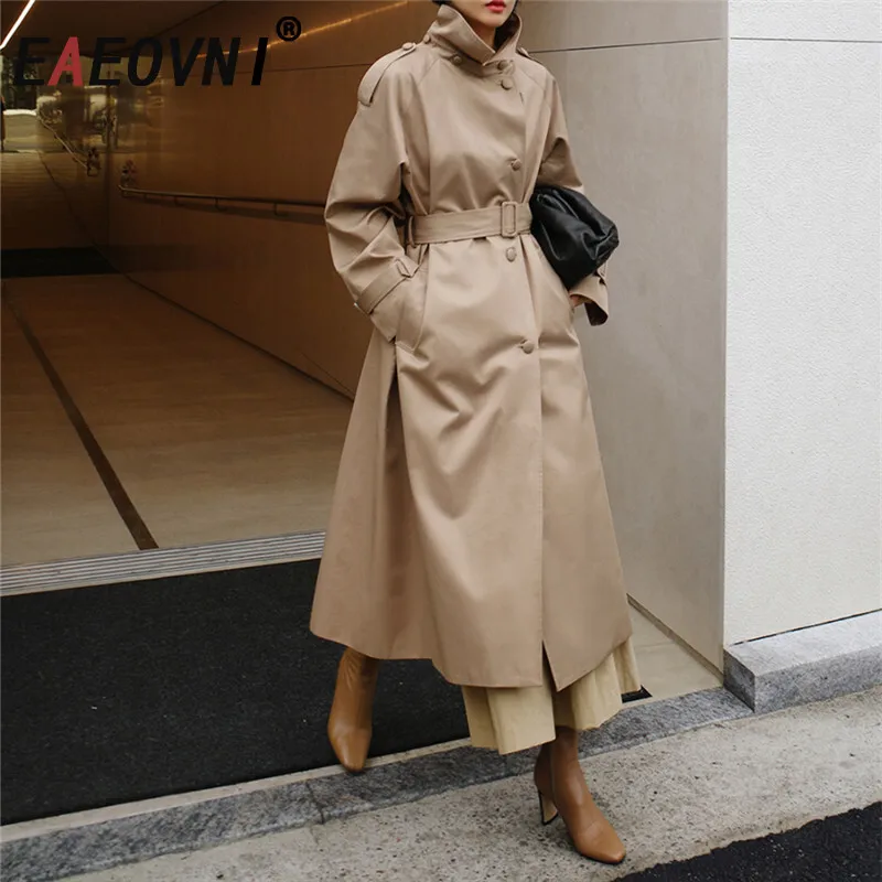 

EAEOVNI Temperament Long Trench Coat Women Solid Color Stand Collar Button Belt Gathered Waist Windbreaker 2025 Autumn New