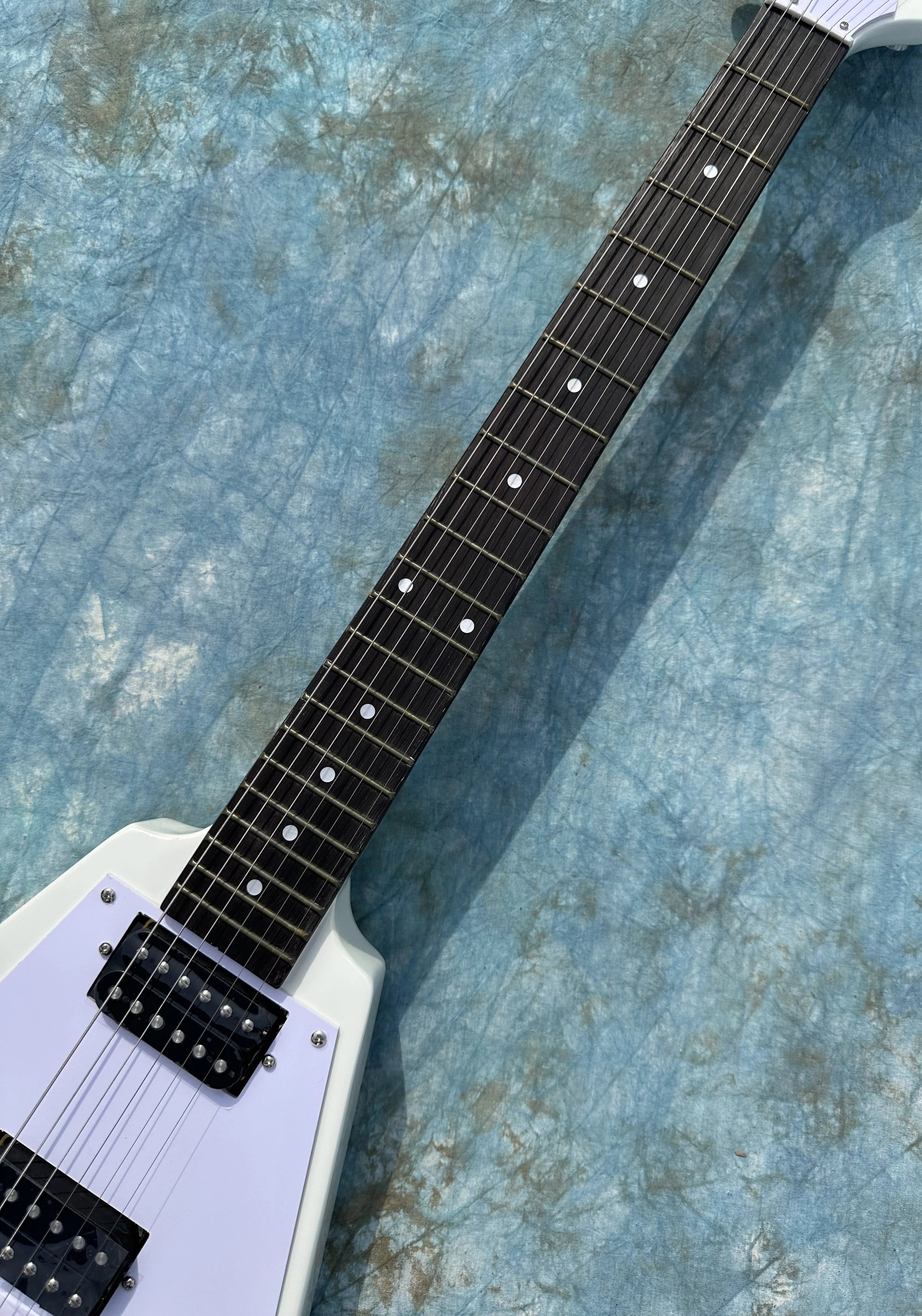 Irregular electric guitar, white flying V, black open pickup, imported wood and paint, shiny, in stock, fast shipping