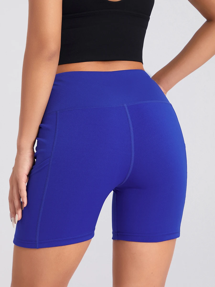 Shorts apertados com bolsos para mulheres, shorts de treino de cintura alta, controle de barriga, ciclismo e corrida