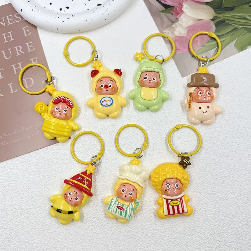 

1/7PCS Cartoon Cute Particle Aliens: Handmade DIY Keychains & Phone Charms, Crafted for Trend Toy Enthusiasts