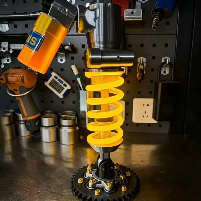Hanging shock absorber desk lamp