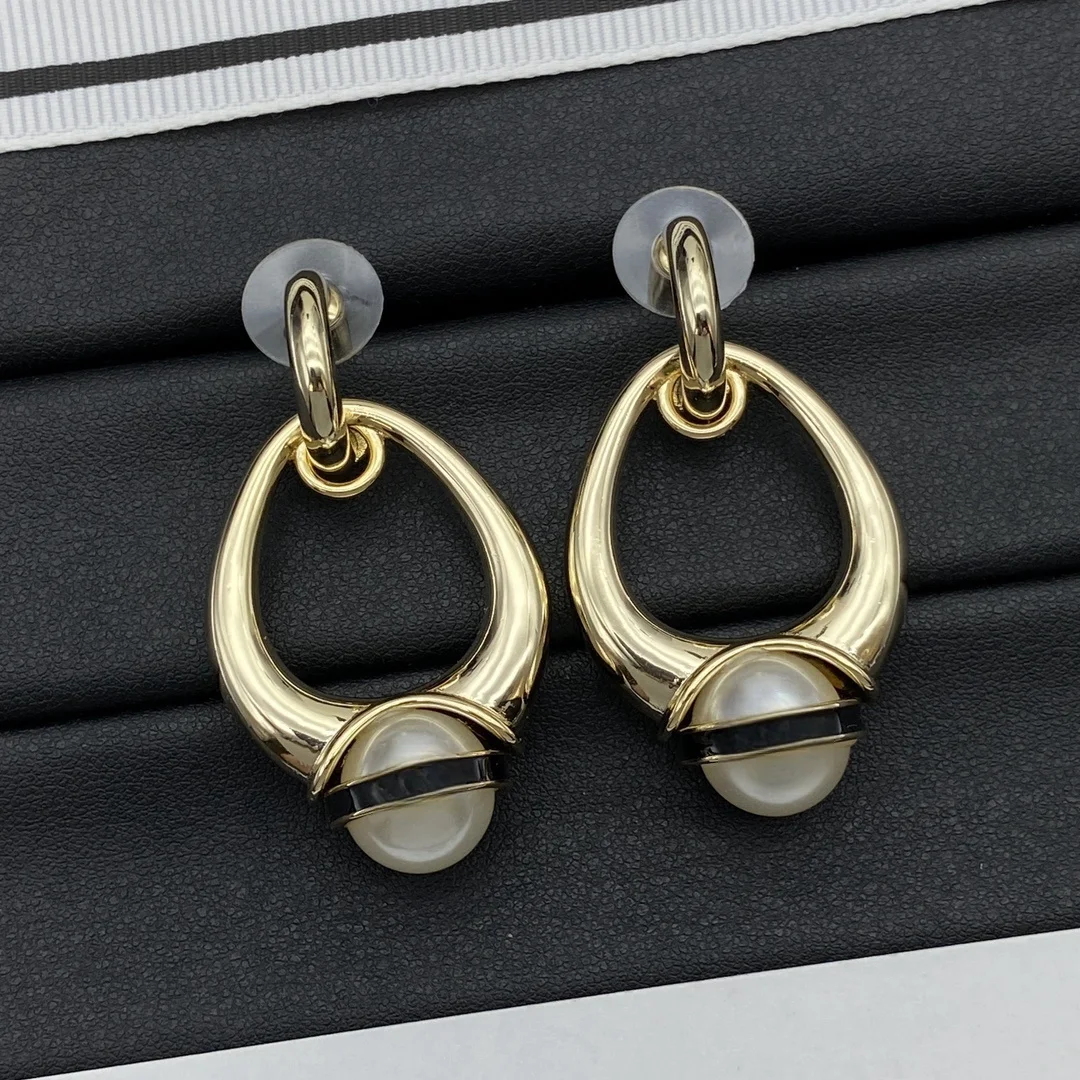 French chic street shoot luxury fashion earrings