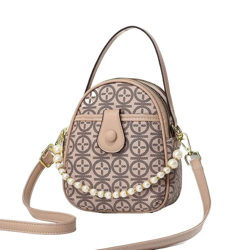 

Популярные новые сумки-мессенджеры весна-лето 2026: маленькие круглые сумочки, повседневные жемчужные сумочки и сумки через плечо — мягкие и легкие.