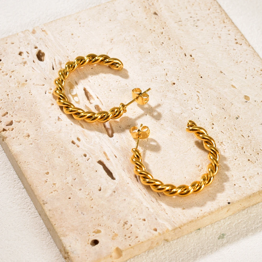 E119 twisted Wave Metal hollowed-out ins Ring Earrings, retro chic, golden stud stainless steel jewelry