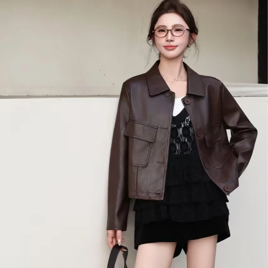 ハイエンドのオートバイレザージャケット、女性用ファッショナブルで多用途なスタンドカラーパッド入りコート、ストリートスタイルのカジュアルアウターウェア
