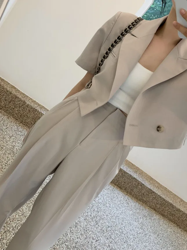 

Шикарный винтажный костюм с коротким рукавом: топ и брюки с высокой талией, широкими штанинами, комплект из двух предметов, модная весенняя коллекция