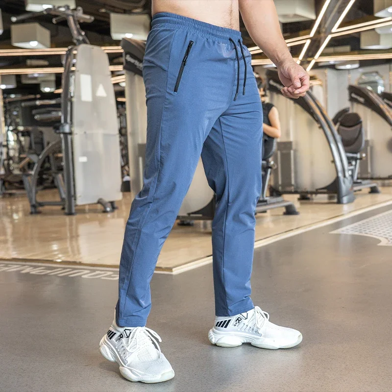 

Men's Basketball Fitness Workout Trousers Muscle Training Stretch Casual Golf Quick Dry Trousers with Drawstring Sweatpants