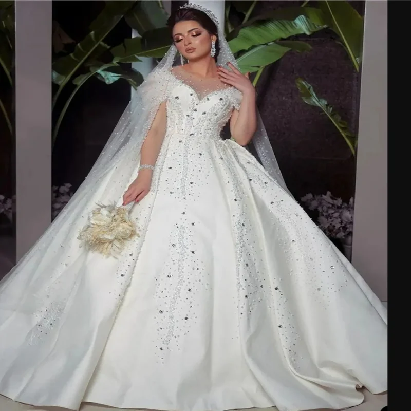 

Customized Scoop Neck Shinny Crystals Beads Wedding Dress For Bride Cap Sleeves Arabic Elegant Plus Size Ballgown Bridal Gowns