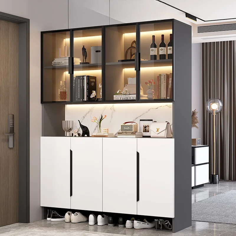 The shoe is integrated against the wall, living room screen is separated from entrance door, and home door is placed
