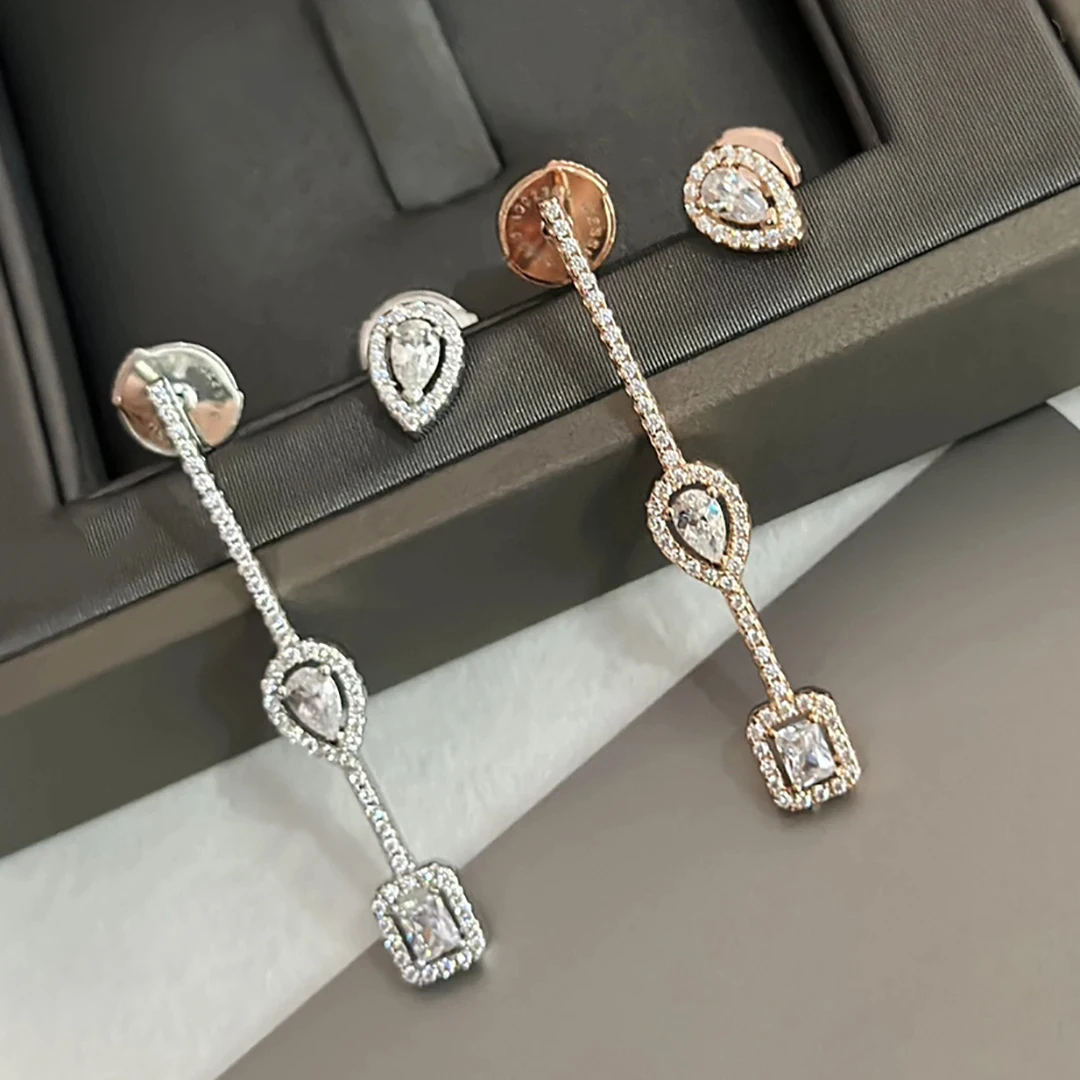 

Серьги-капли из серебра 100% пробы с бриллиантами для моих двойных женщин. Не выцветает и не вызывает аллергию.