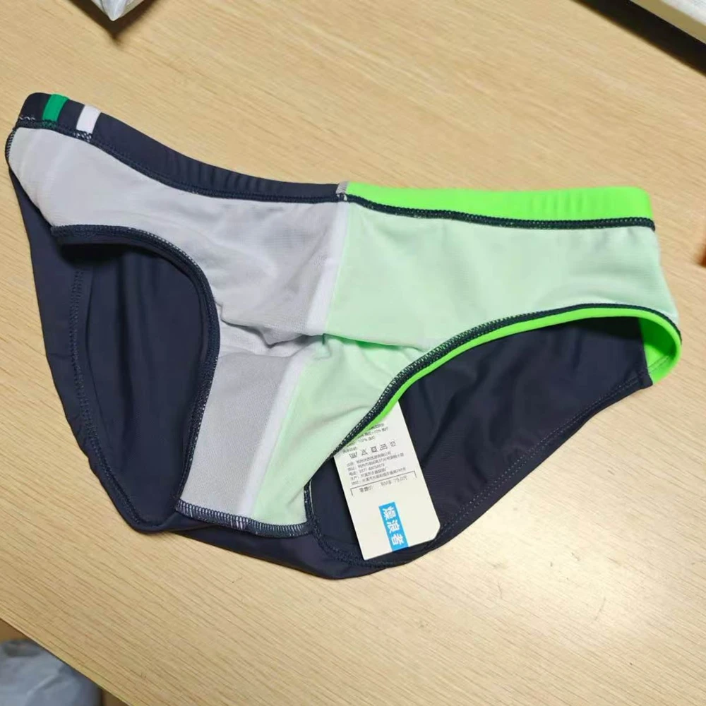 2026Wholesale supply, real shot men's briefs, low waist, color matching tethered beach swimming trunks DMS01