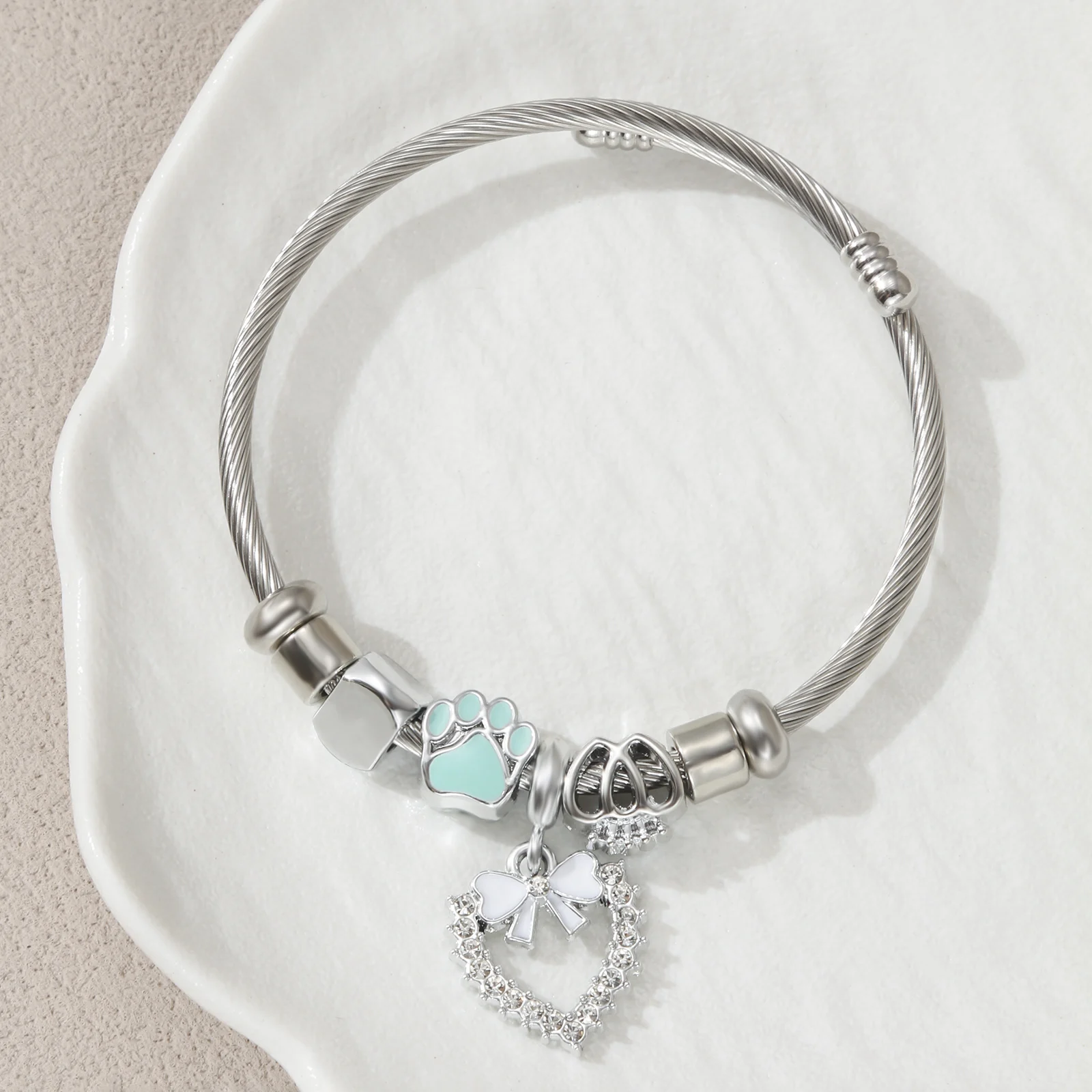 

Silvery Tone Stainless Steel Charm Bangle with Cat Paw and Bow Charms for Women
