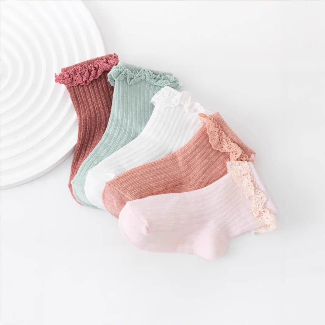 

Amazon newborn dispensing non-slip spring and autumn cotton socks infants and girls solid color lace socks, baby floor socks