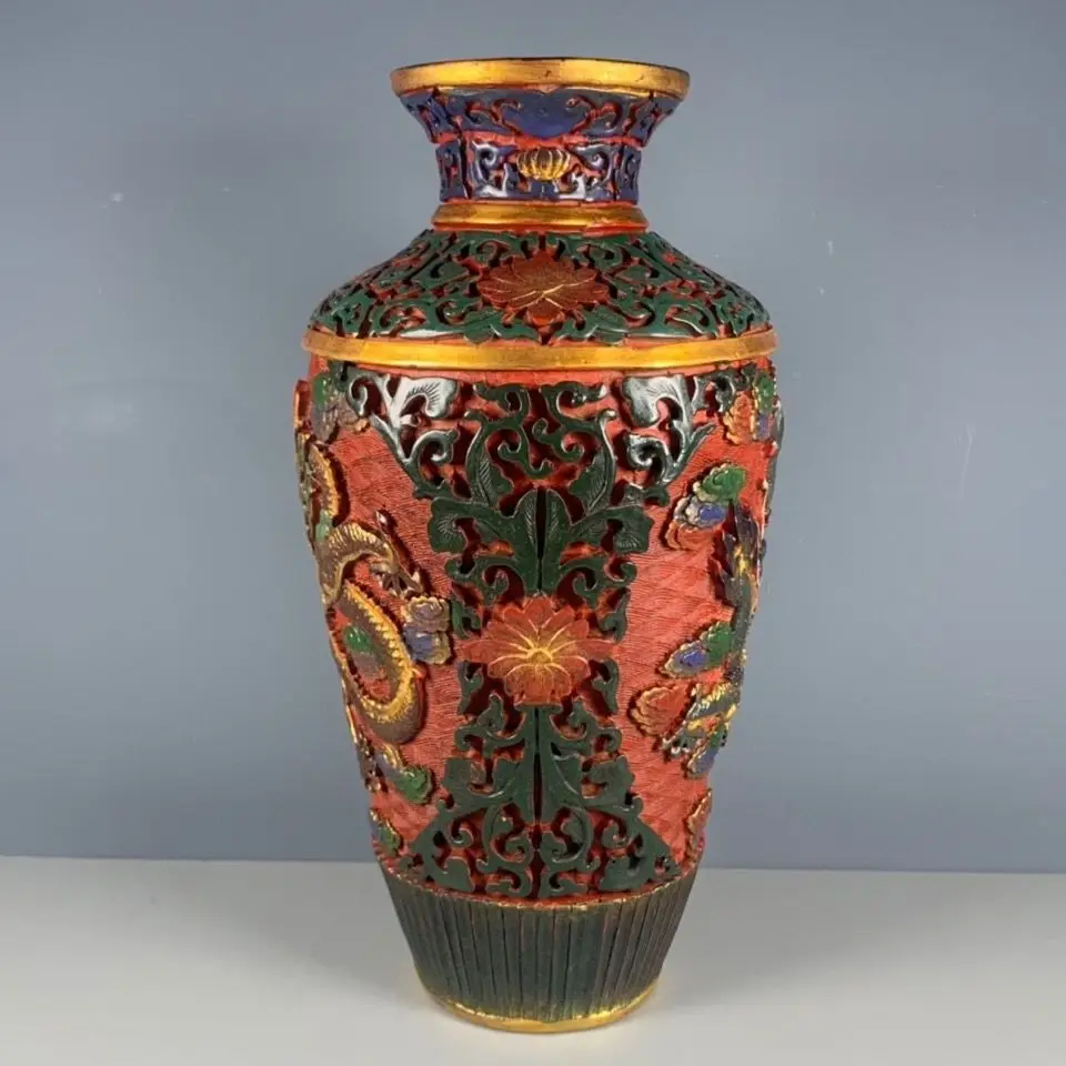 A replica of a Qianlong period lacquerware hand-painted dragon-patterned vase ornament from the Qing Dynasty in China