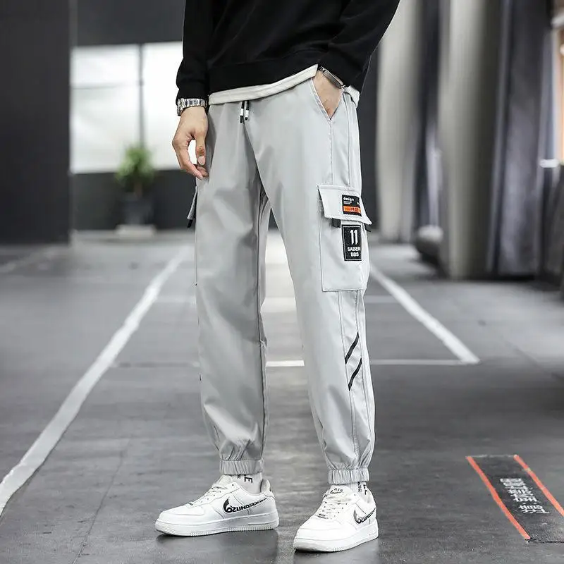 Fashion Thin Patch Loose Men's Cargo Pants Multiple Pockets Waist Drawstring Tie One's Feet Straight Cylinder Male Trousers