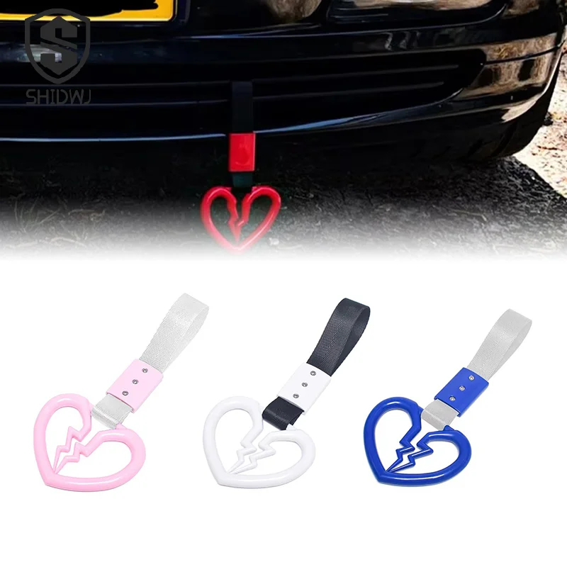 

1 шт., милый сломанный автомобильный антистатический ремешок в форме сердца, декоративное предупреждающее подвесное кольцо, автомобильная ручка, задний передний бампер, предупреждающие кольца